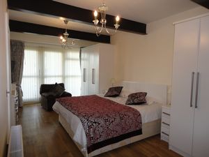 bedroom one- click for photo gallery